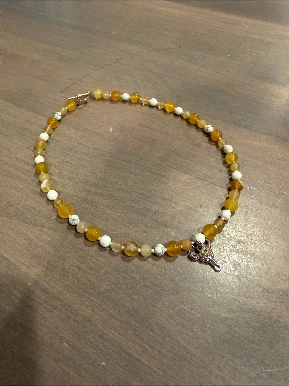 Handmade Yellow and White Beaded Necklace with Bull Charm